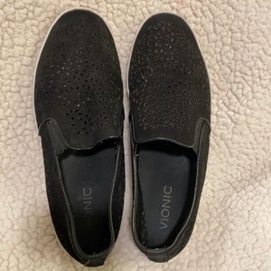 Vionic black laser cut sneakers with white soles